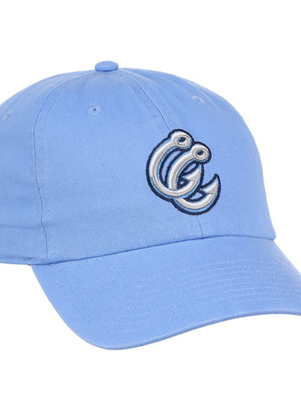 The Ebbets Field Corpus Christi Hooks MiLB Dad Ballcap is a light blue hat featuring an embroidered cartoonish letter C with eyes and a curled design on the front.