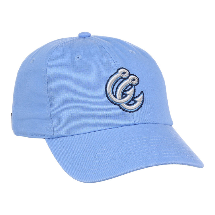 The Ebbets Field Corpus Christi Hooks MiLB Dad Ballcap is a light blue hat featuring an embroidered cartoonish letter C with eyes and a curled design on the front.