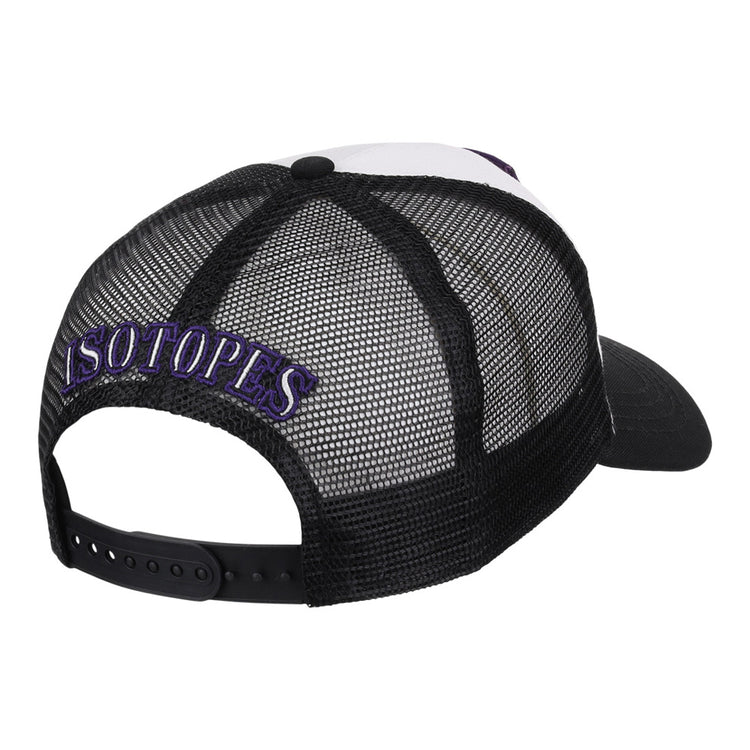 The Ebbets Field Albuquerque Isotopes MiLB Trucker Ballcap features black mesh, white front panels, and “ISOTOPES” embroidered in purple and white above the back opening.