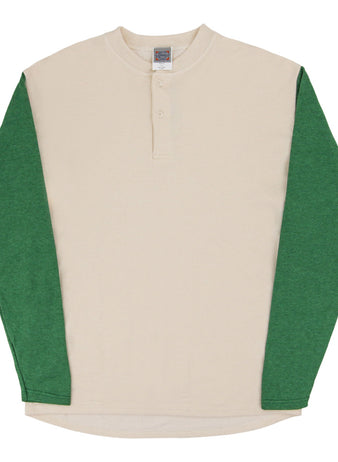 The Ebbets Field Fungo Shirt features green long sleeves, a cream body, a round neck, and a short button placket at the collar.