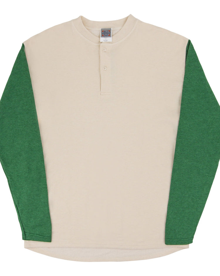 The Ebbets Field Fungo Shirt features green long sleeves, a cream body, a round neck, and a short button placket at the collar.