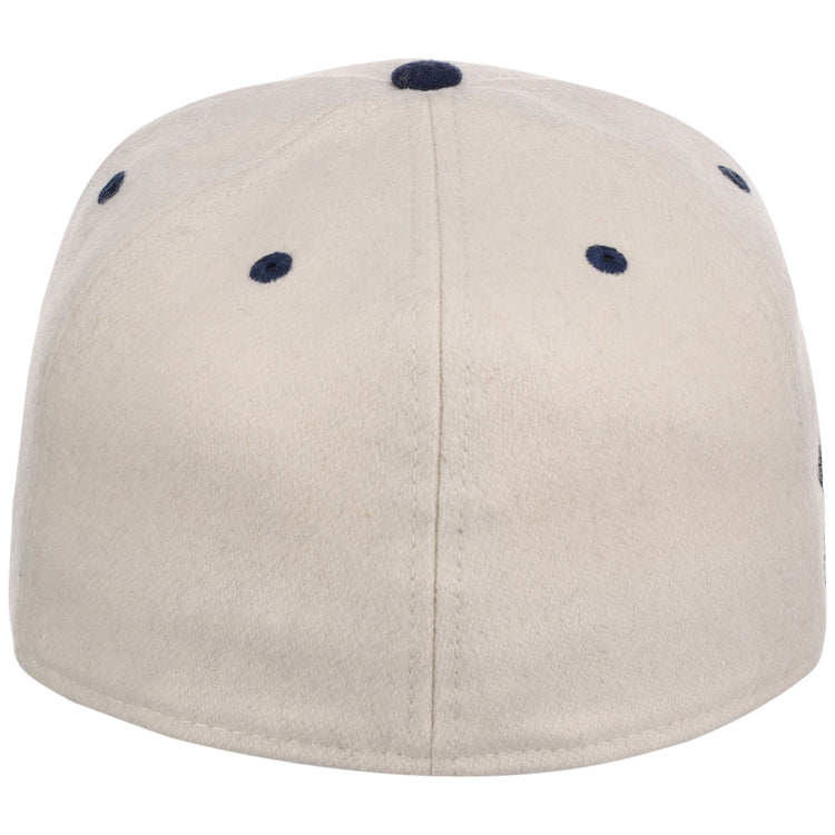 The Seattle Steelheads NLB Ballpark Fitted Ballcap by Ebbets Field is a beige cap seen from the back, with dark blue stitched eyelets and a center button on top.