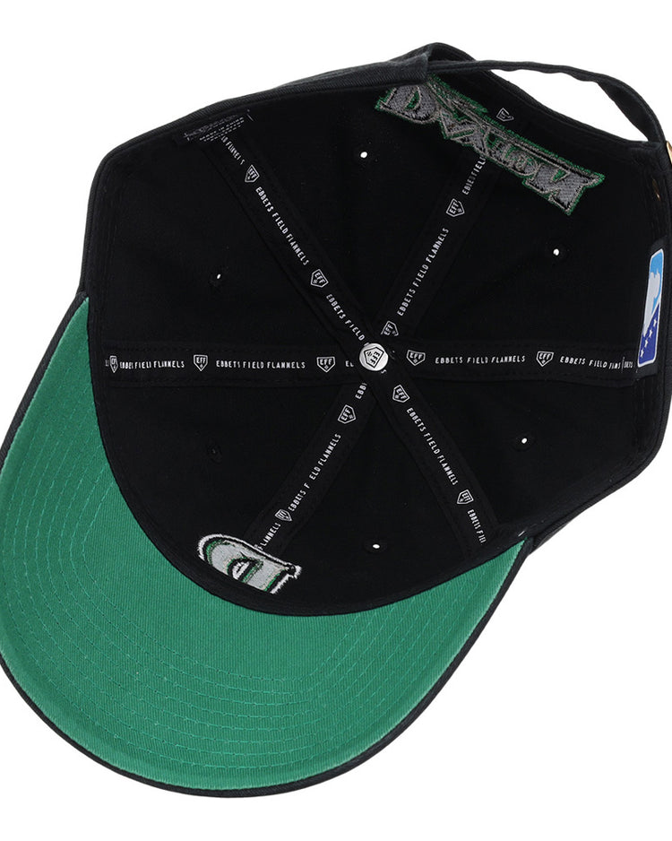 The image shows the inside view of an Ebbets Field Dayton Dragons MiLB Dad Ballcap. It features black panels, white stitching, branded taping, a green underbill, and an adjustable strap at the back.