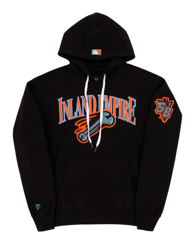 The Ebbets Field Inland Empire 66Ers MiLB Cotton Hooded Sweatshirt is a black hoodie with bold blue and orange INLAND EMPIRE text, a baseball bat graphic on the chest, SB logo patch on the left sleeve, and a small logo near the left cuff.