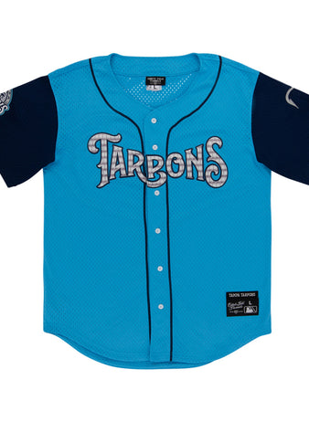 The Ebbets Field Tampa Tarpoons MiLB Button Down Jersey is light blue with 