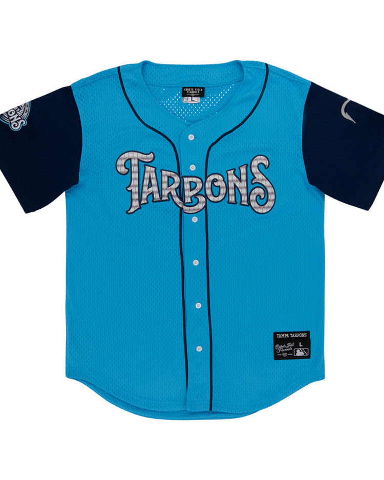 The Ebbets Field Tampa Tarpoons MiLB Button Down Jersey is light blue with 