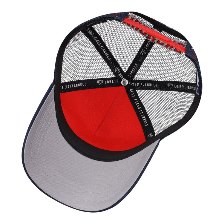 A top-down view of the Toledo Mud Hens MiLB Trucker Ballcap by Ebbets Field, featuring a red crown, black mesh panels, grey brim, and branded black tape reading EBBETS FIELD inside.