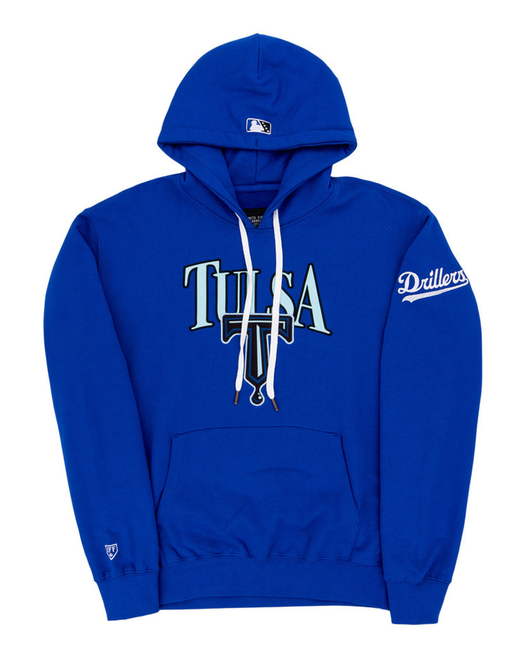 The Ebbets Field Tulsa Drillers MiLB Cotton Hooded Sweatshirt is royal blue with TULSA on the front, a small baseball cap logo on the hood, Drillers on the sleeve, and a front pocket.