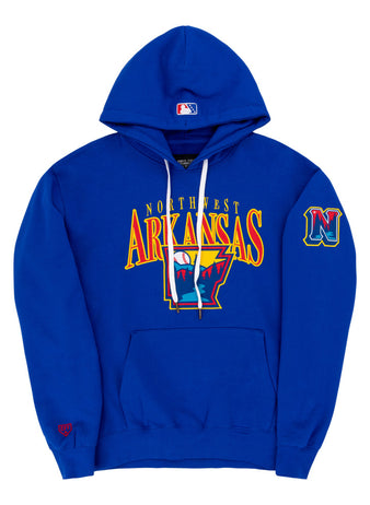 The Ebbets Field Northwest Arkansas Naturals MiLB Cotton Hooded Sweatshirt is royal blue with an Arkansas outline and claw marks on the front, a stylized N logo, an embroidered N patch on the left sleeve, and a red logo on the right cuff.