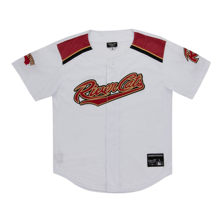 The Ebbets Field Sacramento River Cats MiLB Button Down Jersey is white with red and black accents, features the team logo across the chest, a left sleeve patch, black collar tag, and an official patch near the bottom hem.