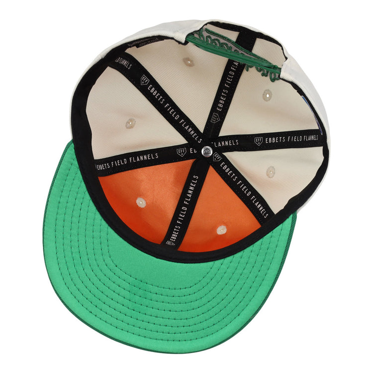 The underside of the Ebbets Field Greensboro Grasshoppers MiLB Snapback Ballcap features a green brim, orange interior panel, white panels, and black taping labeled 