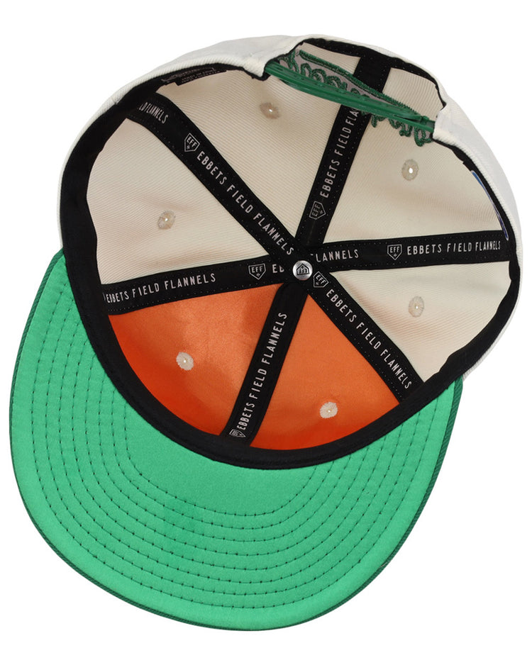 The underside of the Ebbets Field Greensboro Grasshoppers MiLB Snapback Ballcap features a green brim, orange interior panel, white panels, and black taping labeled 