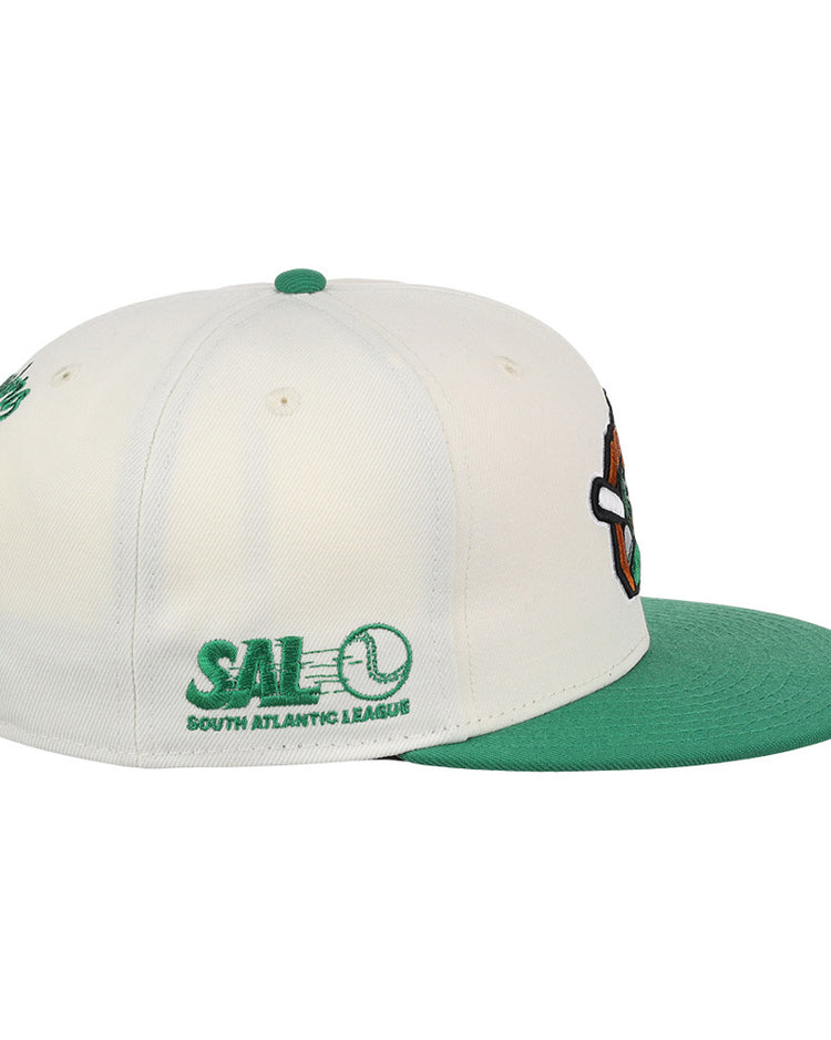 The Ebbets Field Greensboro Grasshoppers MiLB Snapback Ballcap is a white cap with a green brim, a colorful front logo, and green SAL South Atlantic League text and logo embroidered on the side.