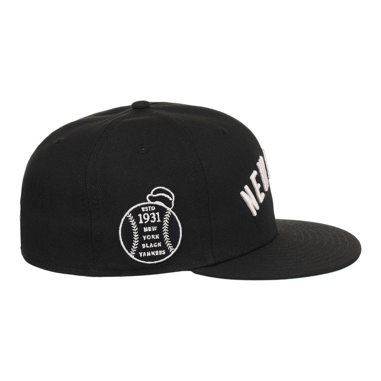 The Ebbets Field New York Black Yankees NLB Black/White Fitted Ballcap features white embroidered 