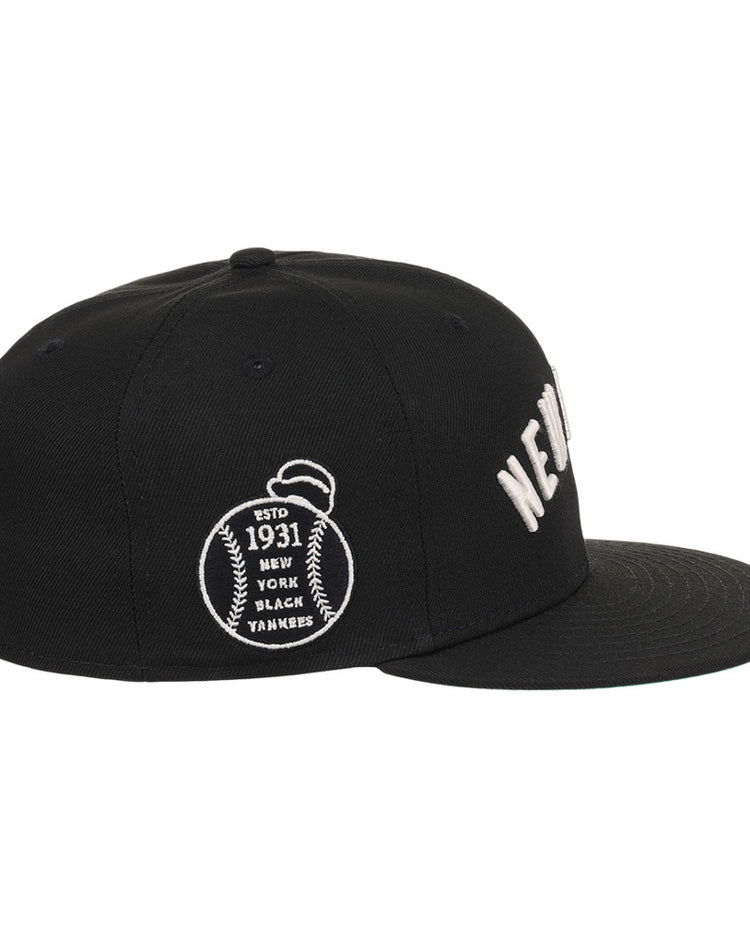 The Ebbets Field New York Black Yankees NLB Black/White Fitted Ballcap features white embroidered 