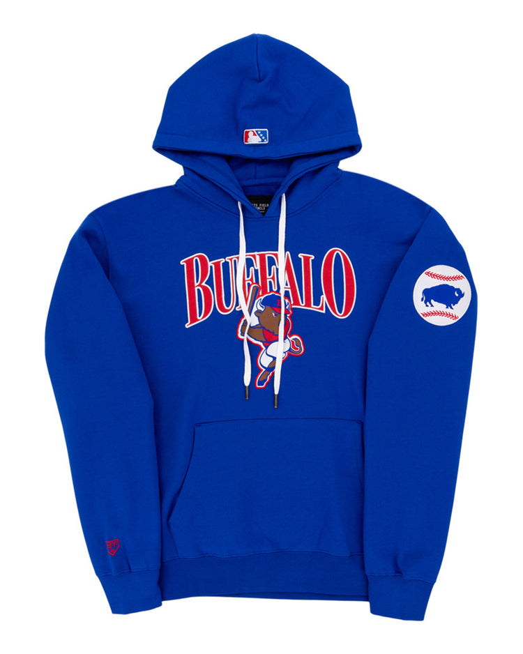 The Ebbets Field Buffalo Bisons MiLB Cotton Hooded Sweatshirt features “Buffalo” across the chest, a cartoon bison with a bat, a white baseball patch with a blue bison on the left sleeve, front pocket, and drawstring hood.