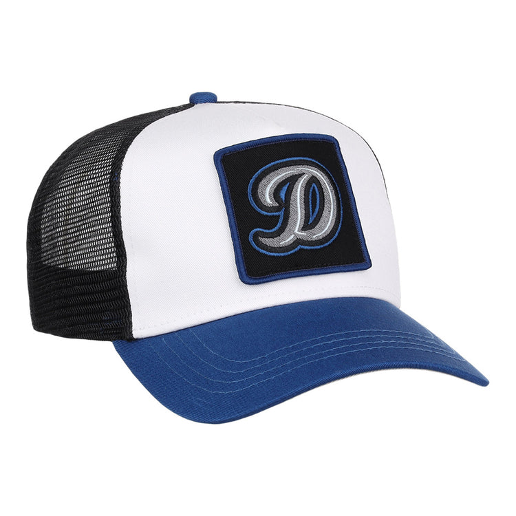 The Ebbets Field Tulsa Drillers MiLB Trucker Ballcap features a white front panel, blue bill, black mesh back, and a black patch with a large embroidered letter D on the front.