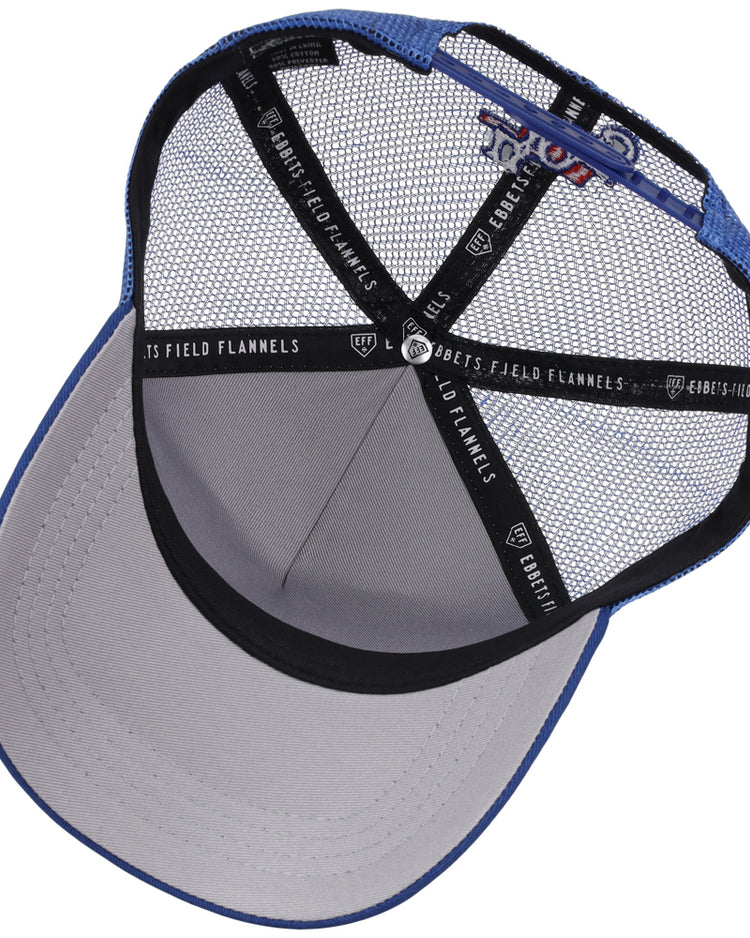 The inside of the Oklahoma City Dodgers MiLB Trucker Ballcap by Ebbets Field is shown, featuring a blue and gray mesh crown, fabric brim, and black interior trim with 