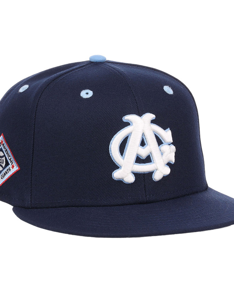 The Ebbets Field Chicago American Giants NLB Varsity Fitted Ballcap features a navy blue design with a white and light blue 