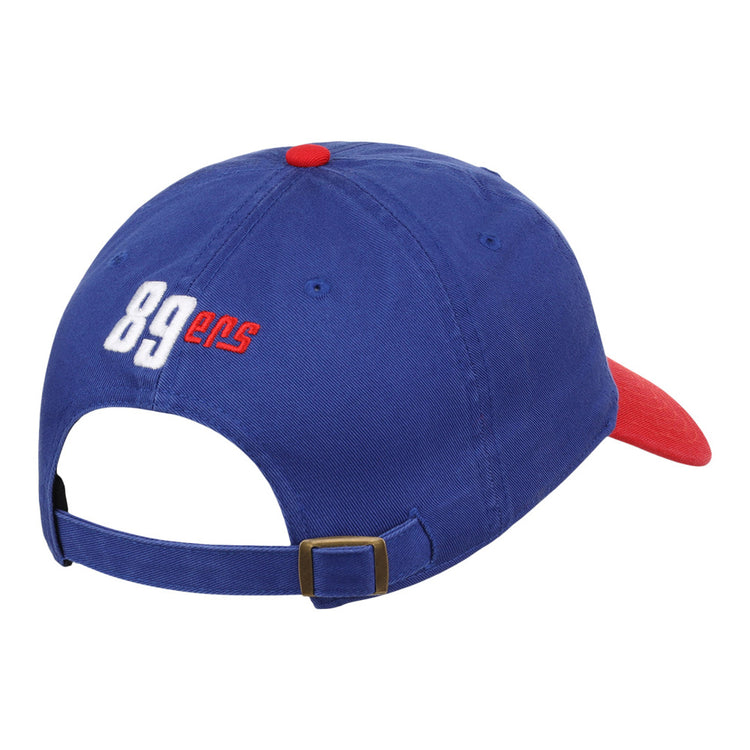 The Ebbets Field Oklahoma City 89Ers MiLB Logo Dad Ballcap is blue with a red brim and top button, 
