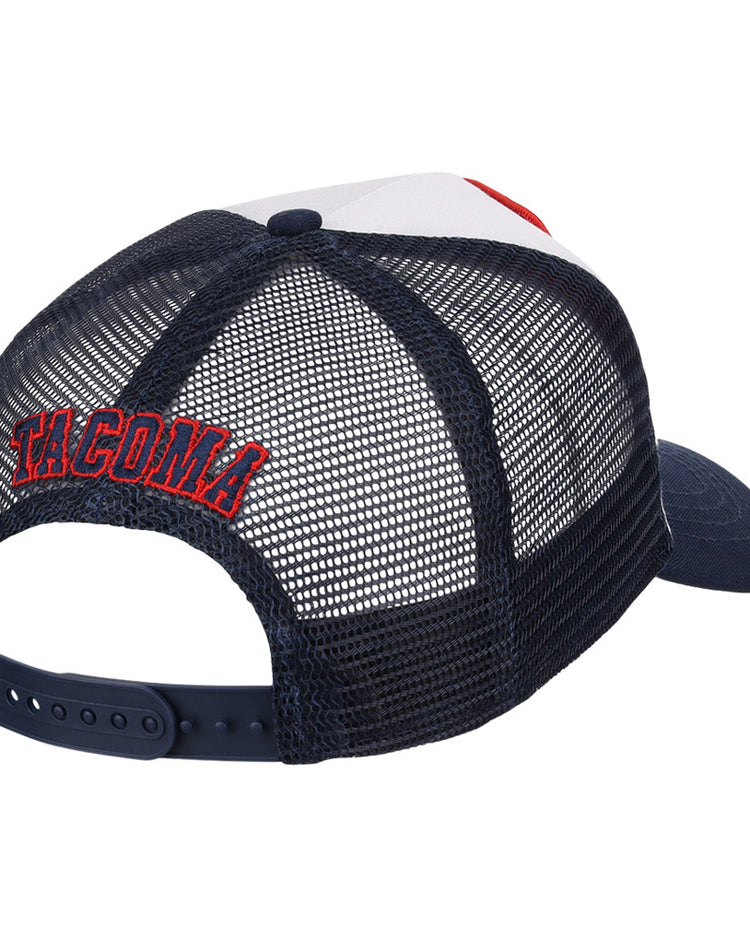 The Ebbets Field Tacoma Rainers MiLB Trucker Ballcap is a navy blue mesh hat with an adjustable snapback and 