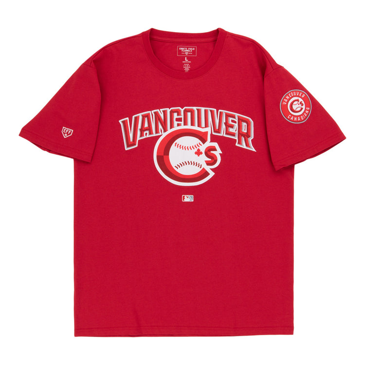 The Vancouver Canadians MiLB Fashion Cotton Short Sleeve Tee by Ebbets Field features a red design with a Vancouver logo and baseball graphic on the chest, plus a circular Vancouver Canadians patch on the left sleeve.