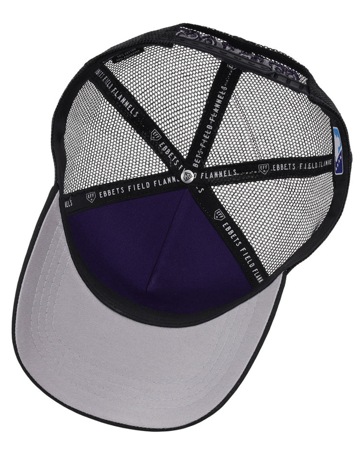 A top-down view of the inside of the Albuquerque Isotopes MiLB Trucker Ballcap by Ebbets Field, featuring a black mesh interior, gray brim, and Ebbets Field branding on the inner black hatbands.