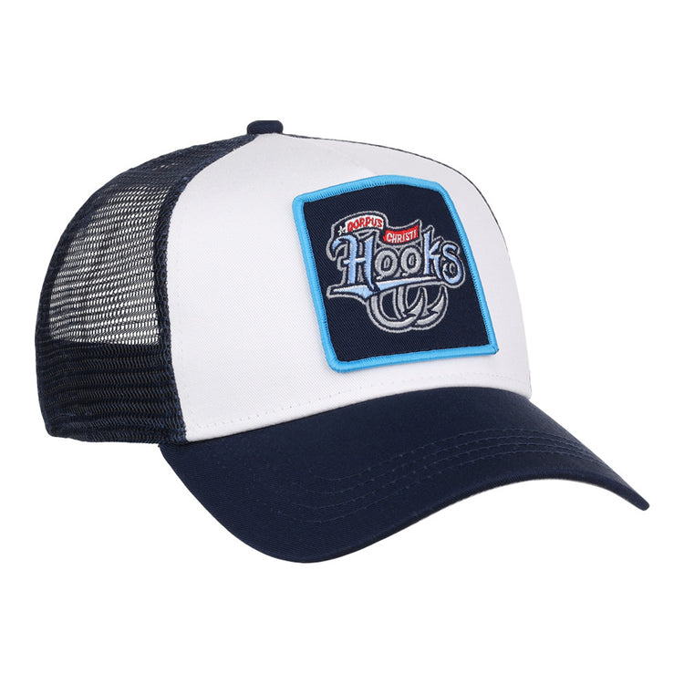 The Ebbets Field Corpus Christi Hooks MiLB Trucker Ballcap is a white and navy mesh-back hat featuring a front patch with “Hooks,” a fishing hook graphic, and the phrase “No Bad Days, Just Cast” above it.
