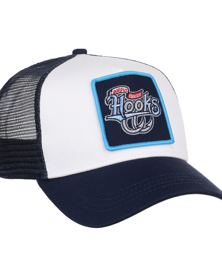 The Ebbets Field Corpus Christi Hooks MiLB Trucker Ballcap is a white and navy mesh-back hat featuring a front patch with “Hooks,” a fishing hook graphic, and the phrase “No Bad Days, Just Cast” above it.