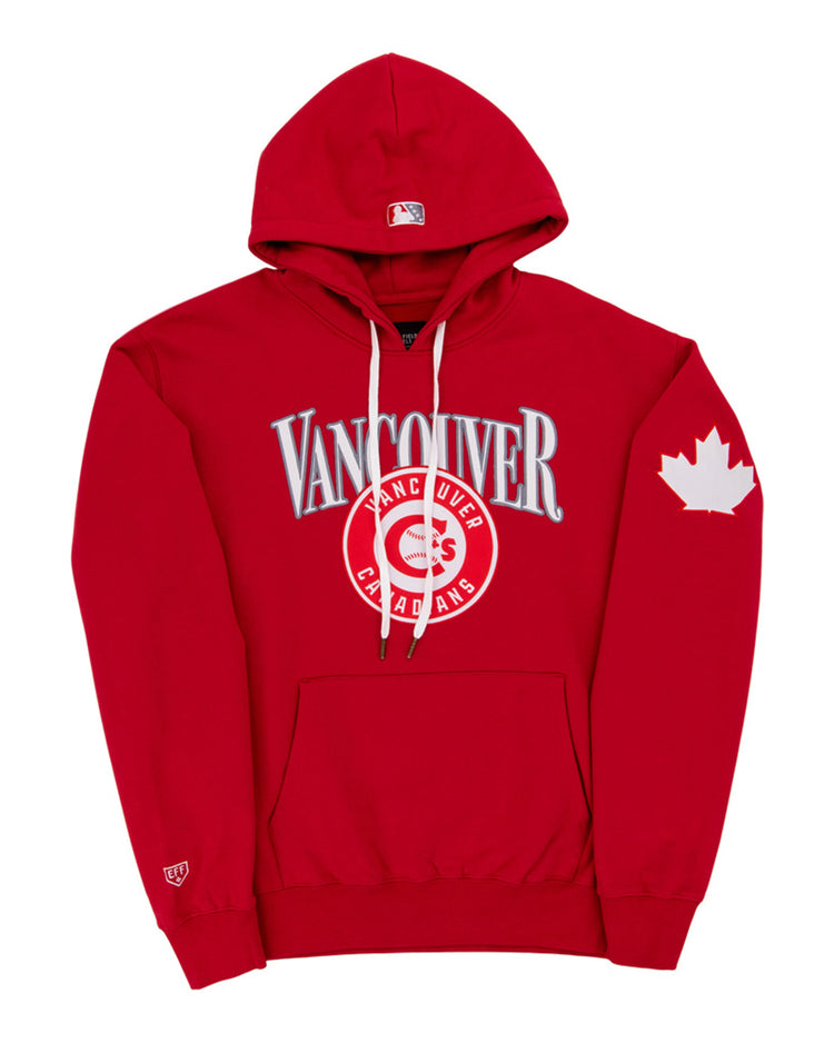The Ebbets Field Vancouver Canadians MiLB Cotton Hooded Sweatshirt features red fabric, “Vancouver” and “Canadians” on the chest, a maple leaf on the left sleeve, white drawstrings, and a front pocket.