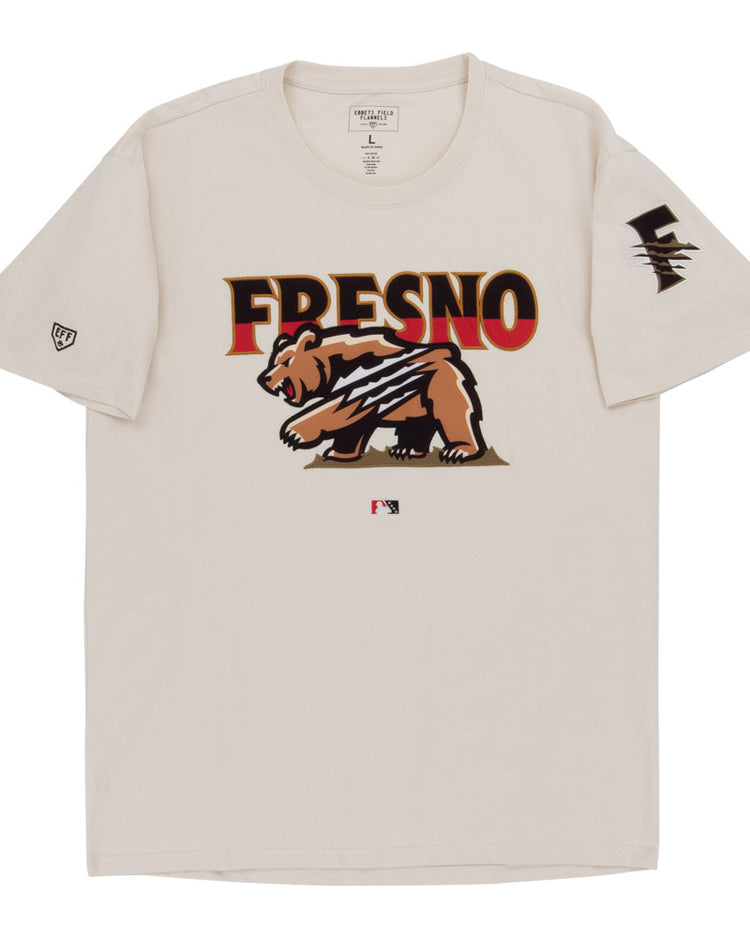 The Ebbets Field Fresno Grizzlies MiLB Fashion Cotton Short Sleeve Tee is a beige shirt with a bear graphic and claw marks, 
