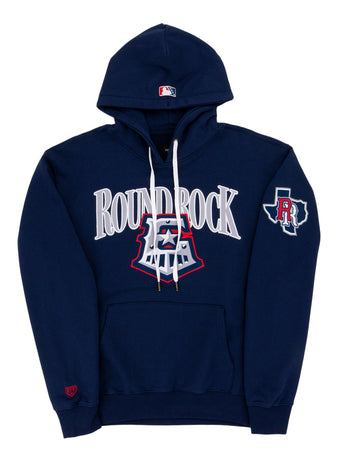 The Ebbets Field Round Rock Express MiLB Cotton Hooded Sweatshirt features navy blue fabric, ROUND ROCK in large white letters on the chest, an emblem below, a left sleeve patch with an R and Texas outline, a front pocket, and white drawstrings.