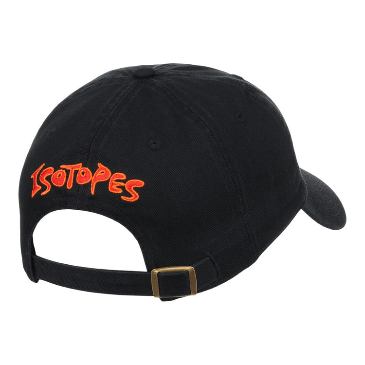 The Ebbets Field Albuquerque Isotopes MiLB Dad Ballcap is a black cap with ISOTOPES in bold orange and yellow on the back, featuring an adjustable strap and metal buckle.