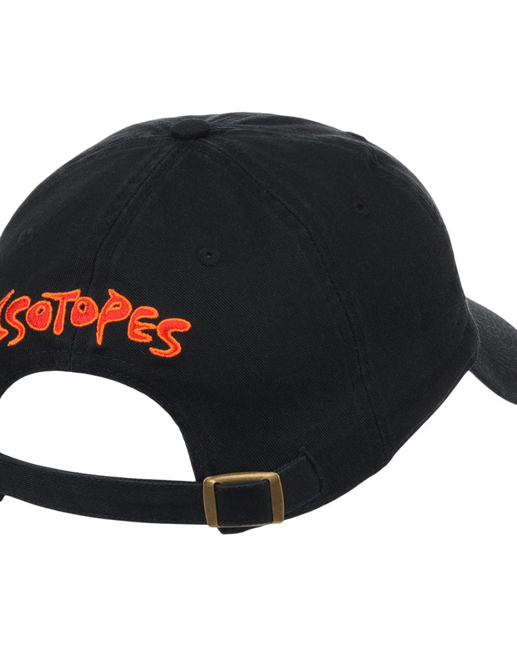 The Ebbets Field Albuquerque Isotopes MiLB Dad Ballcap is a black cap with ISOTOPES in bold orange and yellow on the back, featuring an adjustable strap and metal buckle.