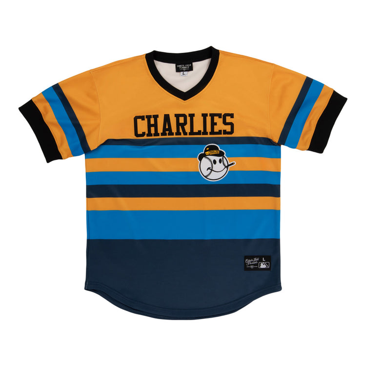 The Ebbets Field Charleston Charlies MiLB Vintage V-Neck Jersey features yellow, blue, and black stripes, CHARLIES text across the chest, and a cartoon baseball character in a yellow cap on the front.