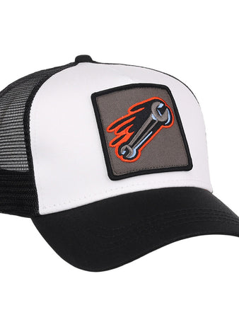 The Inland Empire 66Ers MiLB Trucker Ballcap by Ebbets Field is a black and white hat with a mesh back and a front patch showing a flaming wrench on a gray background.