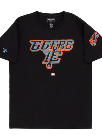 The Ebbets Field Inland Empire 66Ers MiLB Fashion Cotton Short Sleeve Tee features a black design with a blue, orange, and white stylized 66ERS IE logo on the chest, a flaming baseball graphic on the sleeve, and an official MLB logo near the hem.