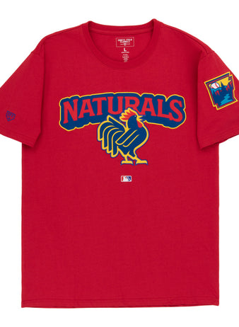 The Ebbets Field Northwest Arkansas Naturals MiLB Fashion Cotton Short Sleeve Tee is a red shirt with a large stylized rooster graphic and 