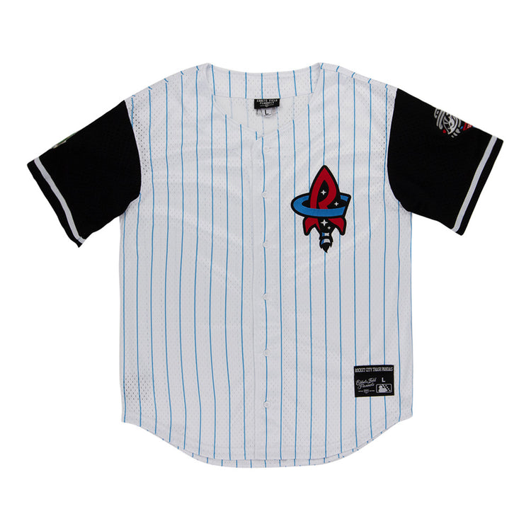 The Ebbets Field Rocket City Trash Pandas MiLB Button Down Jersey is white with thin blue stripes, black sleeves, a red and black rocket logo on the chest, and patches on the lower front and left sleeve.