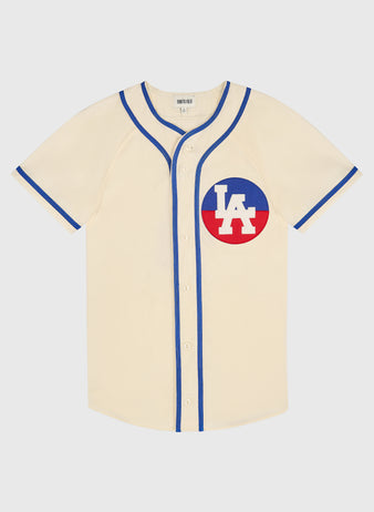 Los Angeles (PCL) 1946 Authentic Wool Home Jersey in cream with short sleeves, blue trim, and a circular red and blue LA logo on the chest.