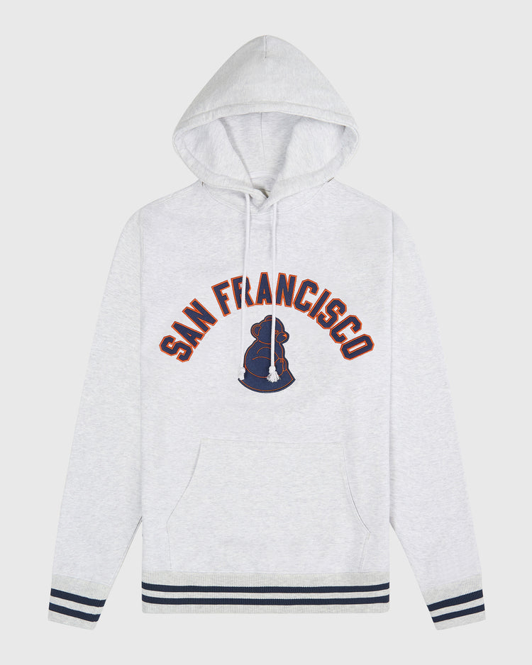Ebbets Field San Francisco Sea Lions Heavyweight Cotton Terry Pullover Hoodie in light gray heather with a kangaroo pocket, navy and orange lettering, a navy seal graphic, and striped cuffs and hem.