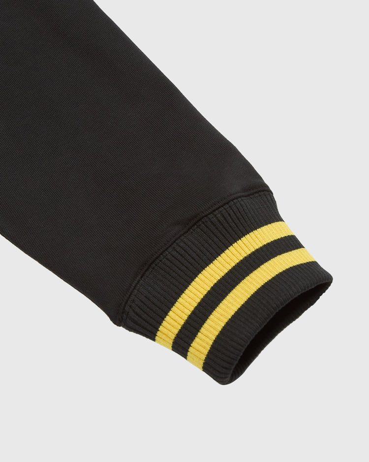 Black Ebbets Field Salt Lake Bees Heavyweight Cotton Terry Pullover Hoodie with a ribbed cuff featuring two horizontal yellow stripes.