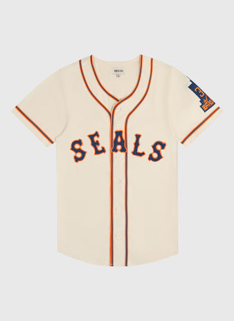 Ebbets Field San Francisco Seals 1938 Cotton Twill Jersey in off-white with navy and orange SEALS lettering, navy and orange trim, and a navy number 3 patch on the left sleeve.