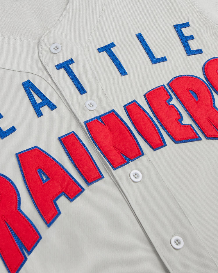 Ebbets Field Seattle Rainiers 1939 Cotton Twill Jersey in light gray cotton twill with SEATTLE RAINIERS appliqued in red felt letters with blue trim.