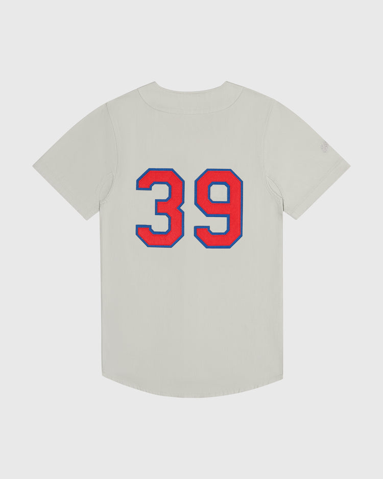 Ebbets Field Seattle Rainiers 1939 Cotton Twill Jersey featuring short sleeves, gray fabric, and the number 39 in red with a blue outline on the back.