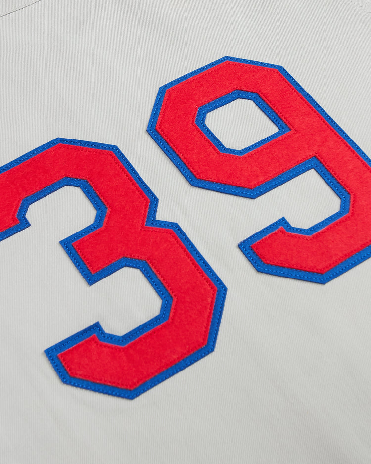 Off-white cotton twill Seattle Rainiers 1939 Cotton Twill Jersey featuring red felt numbers 39 with blue trim.