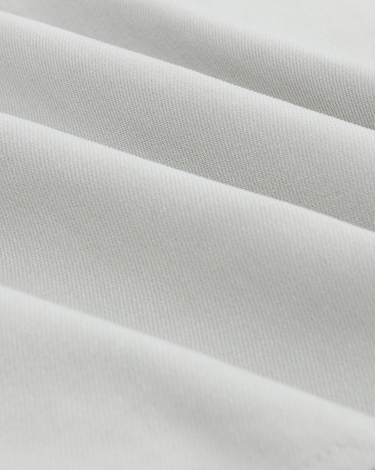Close-up of folds in a light gray Seattle Rainiers 1939 Cotton Twill Jersey.
