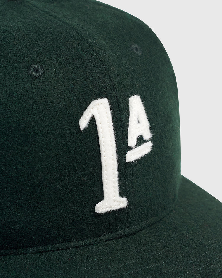 Dark green wool Ebbets Field Mystery Caps of Mexico – Artelleria de México 1926 ballcap featuring a white embroidered 1A on the front.