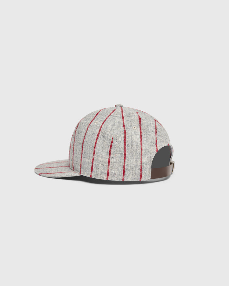 Ebbets Field Mystery Caps of Mexico – Electricistas De Necaxa 1935 Wool Ballcap: a grey wool baseball cap with thin red vertical stripes and a brown leather adjustable back strap.
