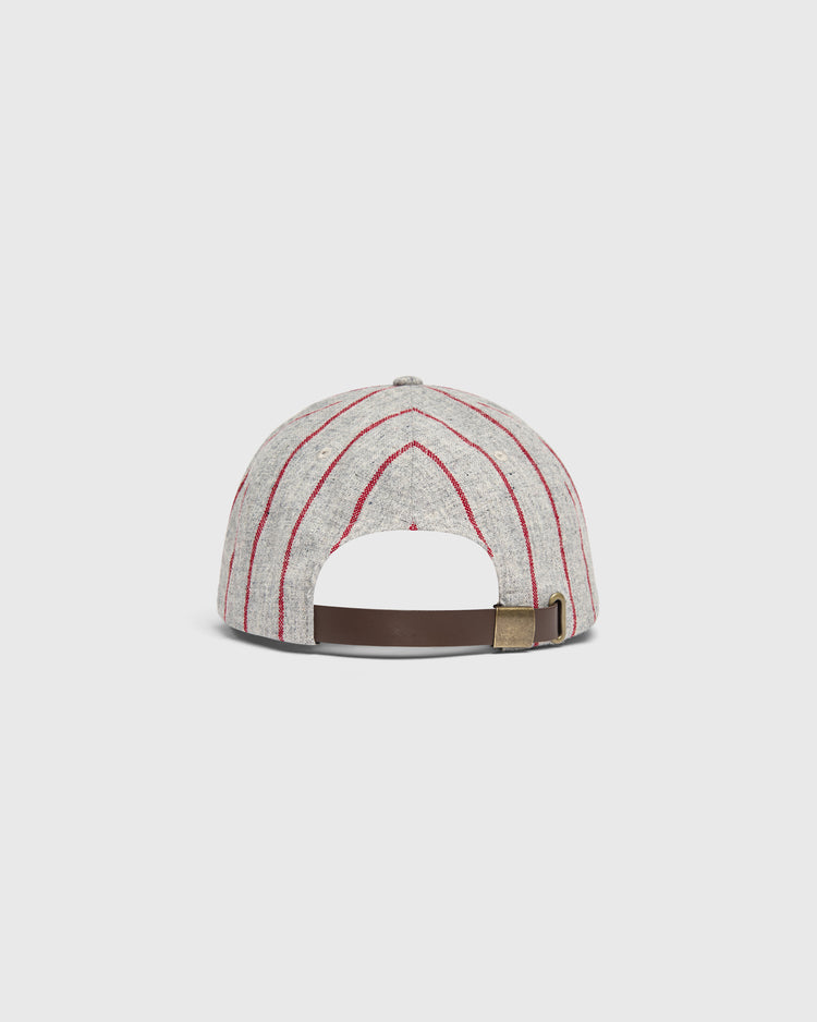 Mystery Caps of Mexico – Electricistas De Necaxa 1935 Wool Ballcap by Ebbets Field: a grey wool ballcap featuring thin red vertical stripes and an adjustable brown leather strap with a brass buckle.